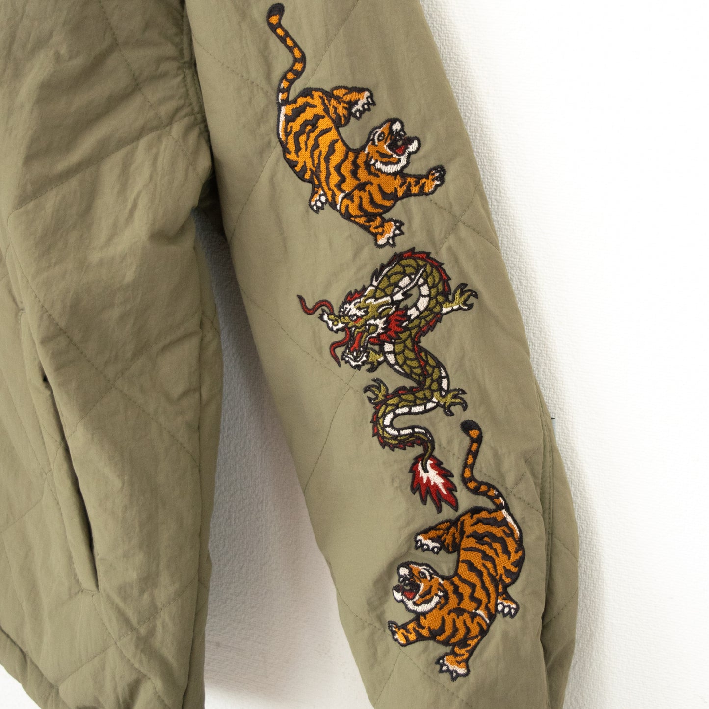 POWER TO THE PEOPLE Tiger and Dragon Embroidered Quilted Jacket in Khaki