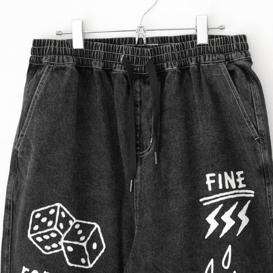 Chemically processed denim rough print pants BLACK