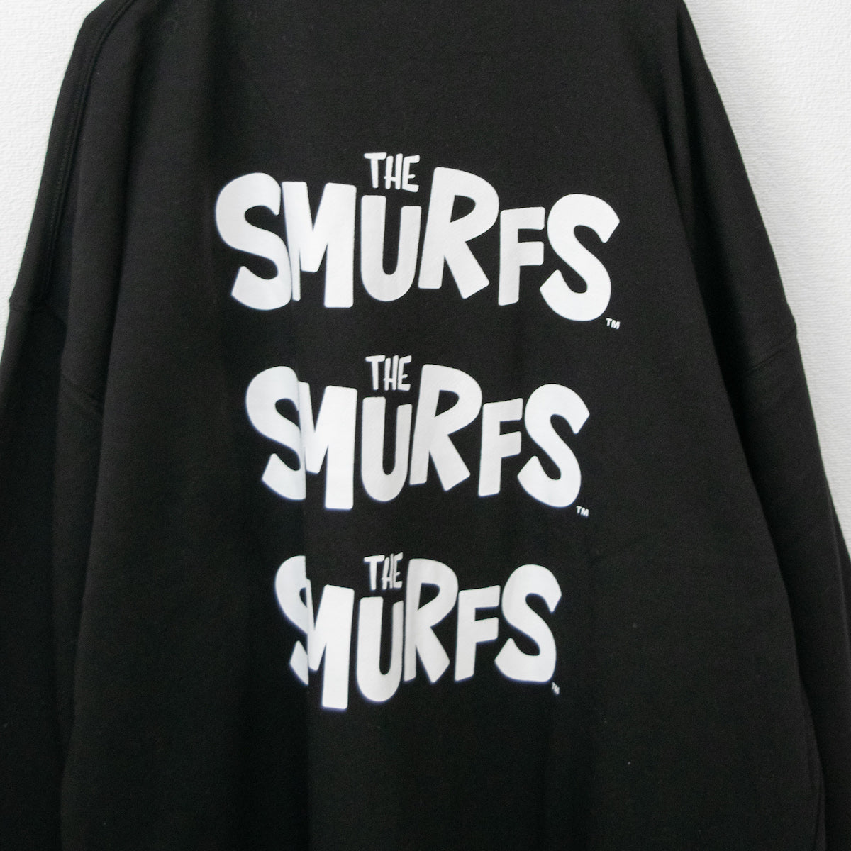 THE SMURFS Smurf character embroidery half zip sweat top BLACK