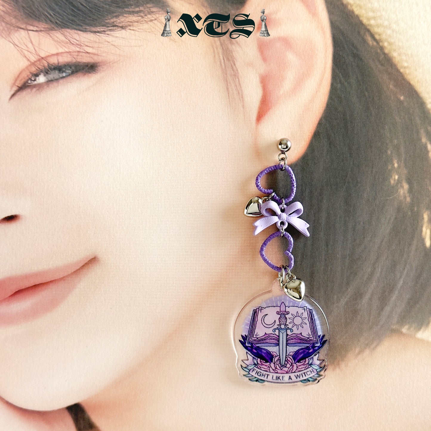 XTS Ribbon Heart Sword Pierced Earrings TS0314