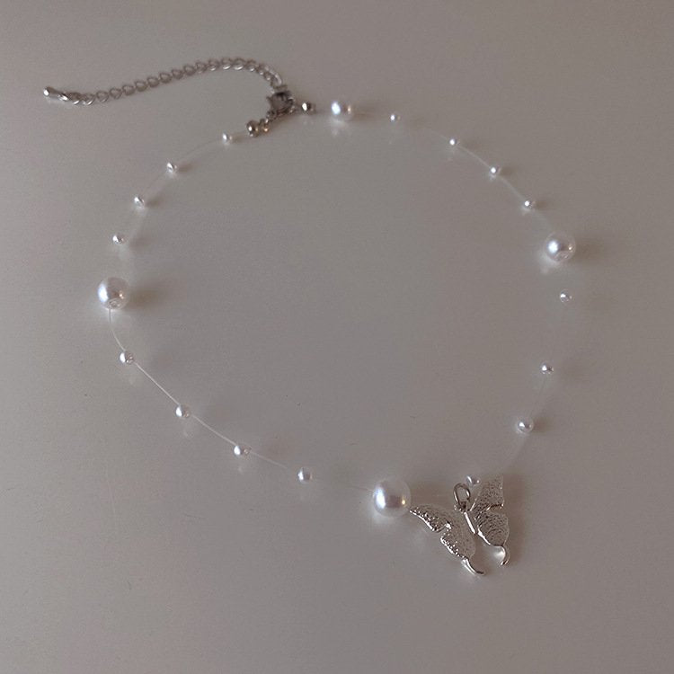 Clear Chord Pearl Butterfly Necklace - YOUAREMYPOISON